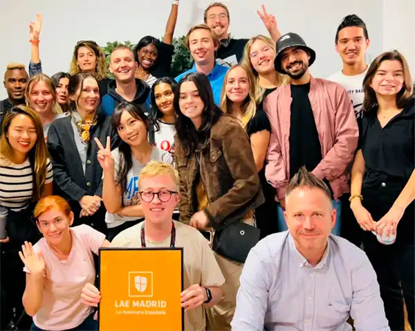 Happy students with diplomas and with student visa.