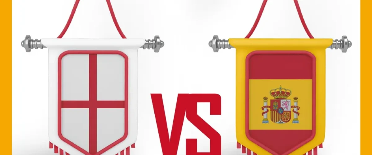 Two hanging pennants side-by-side, one featuring the English flag and the other the Spanish flag, with a red "VS" symbol in between.